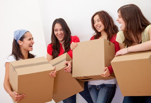 Packed office boxes and furniture prepared for relocation
